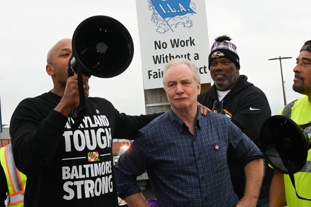 As longshoremen strike continues, Gov. Moore and Sen. Van Hollen visit Dundalk longshoremen